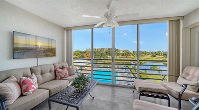 Enjoy sunny, panoramic views across the pool, lakes, and golf on Pinebrook/Ironwood Golf Course in Florida - for sale on GolfHomes.com, golf home, golf lot