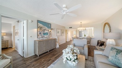 Enjoy sunny, panoramic views across the pool, lakes, and golf on Pinebrook/Ironwood Golf Course in Florida - for sale on GolfHomes.com, golf home, golf lot