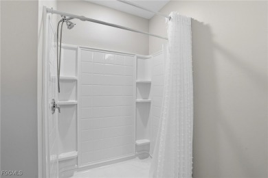 Discover this beautifully appointed 3-bedroom, 2-bathroom home on Sabal Springs Golf and Racquet Club in Florida - for sale on GolfHomes.com, golf home, golf lot