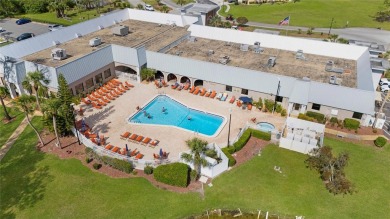 55+ Community ~ Adorable 1 bedroom, 1 bath & 1 carport condo on Summertree Golf Course in Florida - for sale on GolfHomes.com, golf home, golf lot