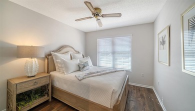 Enjoy sunny, panoramic views across the pool, lakes, and golf on Pinebrook/Ironwood Golf Course in Florida - for sale on GolfHomes.com, golf home, golf lot