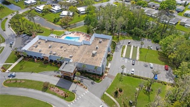 55+ Community ~ Adorable 1 bedroom, 1 bath & 1 carport condo on Summertree Golf Course in Florida - for sale on GolfHomes.com, golf home, golf lot