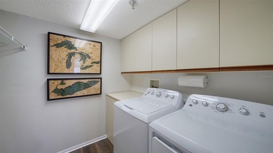 Enjoy sunny, panoramic views across the pool, lakes, and golf on Pinebrook/Ironwood Golf Course in Florida - for sale on GolfHomes.com, golf home, golf lot