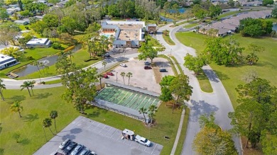 55+ Community ~ Adorable 1 bedroom, 1 bath & 1 carport condo on Summertree Golf Course in Florida - for sale on GolfHomes.com, golf home, golf lot