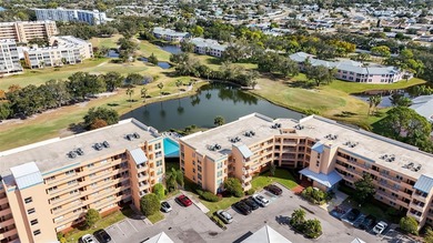 Enjoy sunny, panoramic views across the pool, lakes, and golf on Pinebrook/Ironwood Golf Course in Florida - for sale on GolfHomes.com, golf home, golf lot