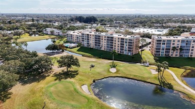 Enjoy sunny, panoramic views across the pool, lakes, and golf on Pinebrook/Ironwood Golf Course in Florida - for sale on GolfHomes.com, golf home, golf lot