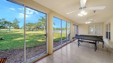 Enjoy sunny, panoramic views across the pool, lakes, and golf on Pinebrook/Ironwood Golf Course in Florida - for sale on GolfHomes.com, golf home, golf lot
