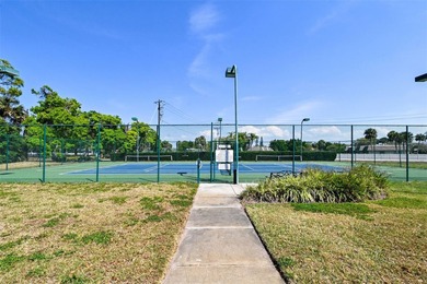 Enjoy sunny, panoramic views across the pool, lakes, and golf on Pinebrook/Ironwood Golf Course in Florida - for sale on GolfHomes.com, golf home, golf lot