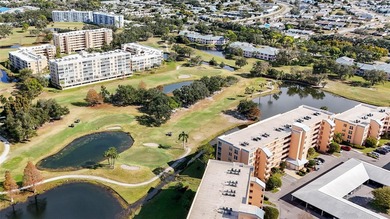 Enjoy sunny, panoramic views across the pool, lakes, and golf on Pinebrook/Ironwood Golf Course in Florida - for sale on GolfHomes.com, golf home, golf lot