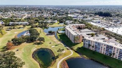 Enjoy sunny, panoramic views across the pool, lakes, and golf on Pinebrook/Ironwood Golf Course in Florida - for sale on GolfHomes.com, golf home, golf lot