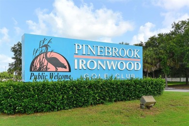 Enjoy sunny, panoramic views across the pool, lakes, and golf on Pinebrook/Ironwood Golf Course in Florida - for sale on GolfHomes.com, golf home, golf lot