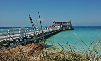 Enjoy sunny, panoramic views across the pool, lakes, and golf on Pinebrook/Ironwood Golf Course in Florida - for sale on GolfHomes.com, golf home, golf lot