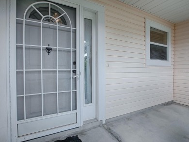 LOCATION! LOCATION! LOCATION! This spacious 3/2 CYPRESS  model on El Diablo Executive Golf Course in Florida - for sale on GolfHomes.com, golf home, golf lot