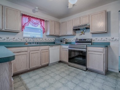 LOCATION! LOCATION! LOCATION! This spacious 3/2 CYPRESS  model on El Diablo Executive Golf Course in Florida - for sale on GolfHomes.com, golf home, golf lot