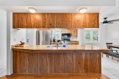 This beautifully maintained home has had all the big-ticket on Meadow Oaks Golf and Country Club in Florida - for sale on GolfHomes.com, golf home, golf lot