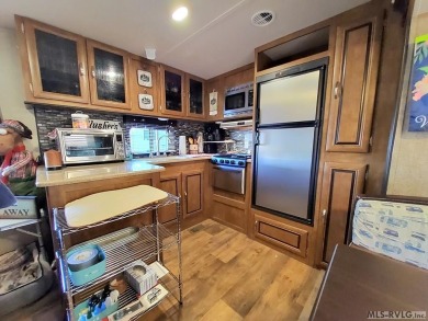 Begin your journey to relaxation at River Ridge Golf & Camping on River Ridge Golf Club in Virginia - for sale on GolfHomes.com, golf home, golf lot
