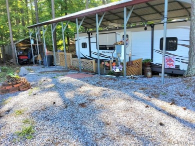 Begin your journey to relaxation at River Ridge Golf & Camping on River Ridge Golf Club in Virginia - for sale on GolfHomes.com, golf home, golf lot