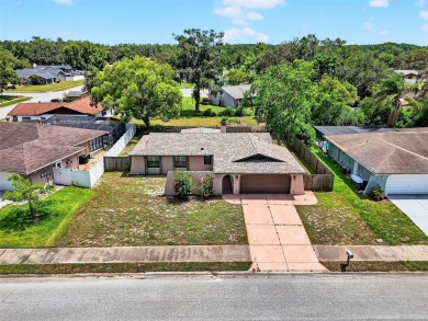 This beautifully maintained home has had all the big-ticket on Meadow Oaks Golf and Country Club in Florida - for sale on GolfHomes.com, golf home, golf lot