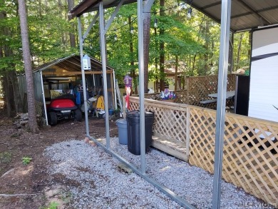 Begin your journey to relaxation at River Ridge Golf & Camping on River Ridge Golf Club in Virginia - for sale on GolfHomes.com, golf home, golf lot