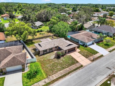 This beautifully maintained home has had all the big-ticket on Meadow Oaks Golf and Country Club in Florida - for sale on GolfHomes.com, golf home, golf lot