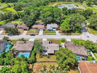 This beautifully maintained home has had all the big-ticket on Meadow Oaks Golf and Country Club in Florida - for sale on GolfHomes.com, golf home, golf lot