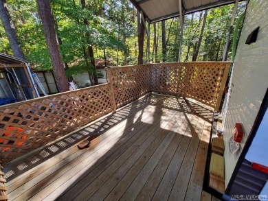 Begin your journey to relaxation at River Ridge Golf & Camping on River Ridge Golf Club in Virginia - for sale on GolfHomes.com, golf home, golf lot