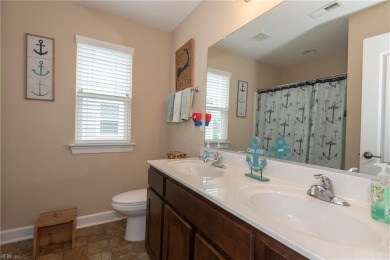 PRICE RECENTLY REDUCED! Welcome to this dreamy 2-story on Nansemond River Golf Club in Virginia - for sale on GolfHomes.com, golf home, golf lot