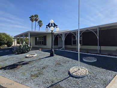 Spacious Mesa home offering a comfortable floor plan, generous on Fountain of the Sun Country Club in Arizona - for sale on GolfHomes.com, golf home, golf lot