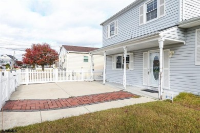 This traditional, split-level home is freshly painted just on The Links At Brigantine Beach in New Jersey - for sale on GolfHomes.com, golf home, golf lot