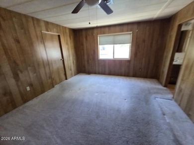 Spacious Mesa home offering a comfortable floor plan, generous on Fountain of the Sun Country Club in Arizona - for sale on GolfHomes.com, golf home, golf lot