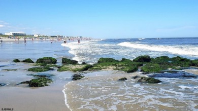 This traditional, split-level home is freshly painted just on The Links At Brigantine Beach in New Jersey - for sale on GolfHomes.com, golf home, golf lot