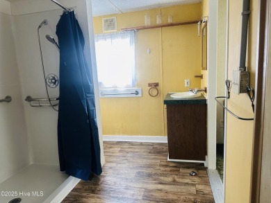 Affordable 3BDR/2BA single-wide manufactured home on one acre on Rivers Edge Golf Club in North Carolina - for sale on GolfHomes.com, golf home, golf lot