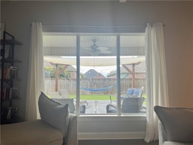 Located in a quiet, family-friendly neighborhood, this home is on Stonebridge Meadows Golf Club in Arkansas - for sale on GolfHomes.com, golf home, golf lot