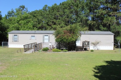 Affordable 3BDR/2BA single-wide manufactured home on one acre on Rivers Edge Golf Club in North Carolina - for sale on GolfHomes.com, golf home, golf lot