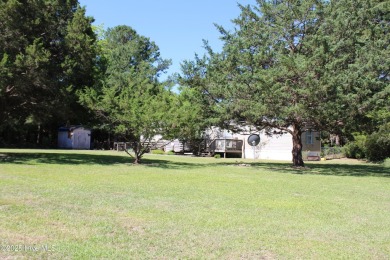 Affordable 3BDR/2BA single-wide manufactured home on one acre on Rivers Edge Golf Club in North Carolina - for sale on GolfHomes.com, golf home, golf lot