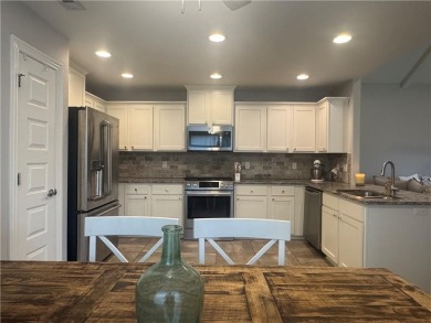 Located in a quiet, family-friendly neighborhood, this home is on Stonebridge Meadows Golf Club in Arkansas - for sale on GolfHomes.com, golf home, golf lot