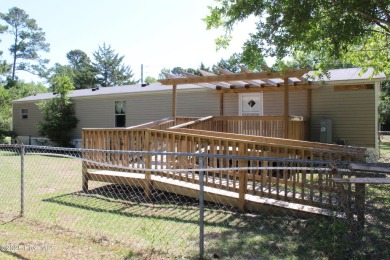 Affordable 3BDR/2BA single-wide manufactured home on one acre on Rivers Edge Golf Club in North Carolina - for sale on GolfHomes.com, golf home, golf lot