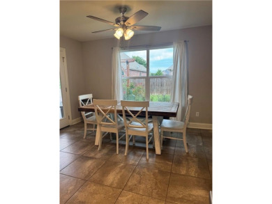 Located in a quiet, family-friendly neighborhood, this home is on Stonebridge Meadows Golf Club in Arkansas - for sale on GolfHomes.com, golf home, golf lot