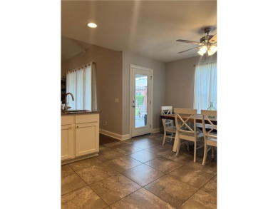 Located in a quiet, family-friendly neighborhood, this home is on Stonebridge Meadows Golf Club in Arkansas - for sale on GolfHomes.com, golf home, golf lot