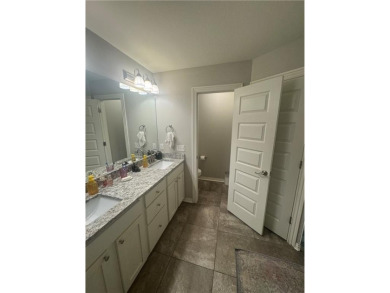 Located in a quiet, family-friendly neighborhood, this home is on Stonebridge Meadows Golf Club in Arkansas - for sale on GolfHomes.com, golf home, golf lot