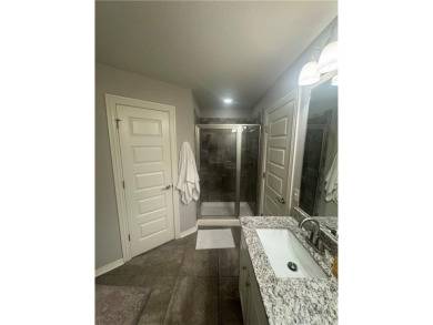 Located in a quiet, family-friendly neighborhood, this home is on Stonebridge Meadows Golf Club in Arkansas - for sale on GolfHomes.com, golf home, golf lot