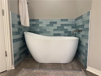 Located in a quiet, family-friendly neighborhood, this home is on Stonebridge Meadows Golf Club in Arkansas - for sale on GolfHomes.com, golf home, golf lot