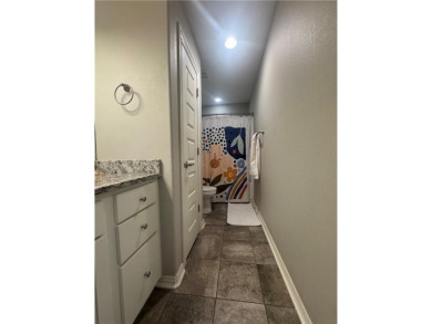 Located in a quiet, family-friendly neighborhood, this home is on Stonebridge Meadows Golf Club in Arkansas - for sale on GolfHomes.com, golf home, golf lot