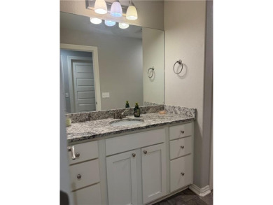 Located in a quiet, family-friendly neighborhood, this home is on Stonebridge Meadows Golf Club in Arkansas - for sale on GolfHomes.com, golf home, golf lot