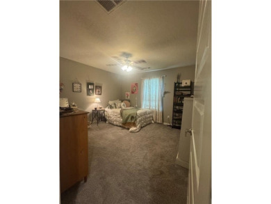 Located in a quiet, family-friendly neighborhood, this home is on Stonebridge Meadows Golf Club in Arkansas - for sale on GolfHomes.com, golf home, golf lot