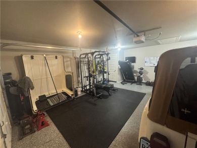Located in a quiet, family-friendly neighborhood, this home is on Stonebridge Meadows Golf Club in Arkansas - for sale on GolfHomes.com, golf home, golf lot