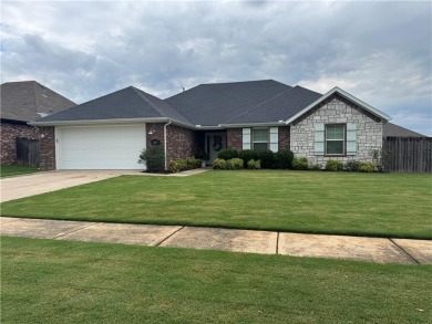 Located in a quiet, family-friendly neighborhood, this home is on Stonebridge Meadows Golf Club in Arkansas - for sale on GolfHomes.com, golf home, golf lot
