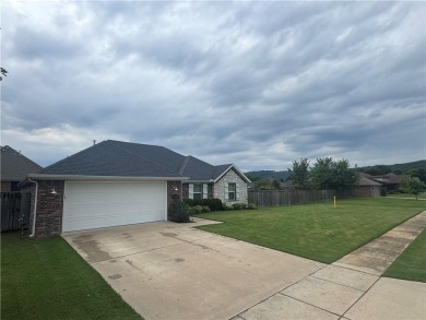 Located in a quiet, family-friendly neighborhood, this home is on Stonebridge Meadows Golf Club in Arkansas - for sale on GolfHomes.com, golf home, golf lot
