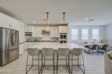 Stunning home located in the prestigious, guard-gated community on Sterling Grove Golf & Country Club in Arizona - for sale on GolfHomes.com, golf home, golf lot