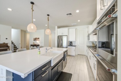 Stunning home located in the prestigious, guard-gated community on Sterling Grove Golf & Country Club in Arizona - for sale on GolfHomes.com, golf home, golf lot